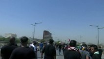 مراسل العربية: المحتجون عبروا الحواجز الأمنية على جسري الجمهورية والسنك في بغداد