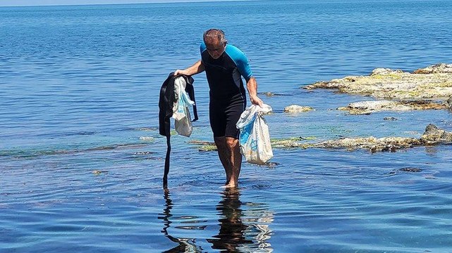 Çevreci dalgıcı ağlatan manzara