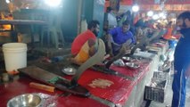 Huge fish Cutter experts are cutting different type of fish in a traditional way