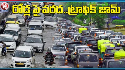 Traffic Jam At Rajender Nagar 191 Pillar Over Water Logging On Roads _ Ranga Reddy _ V6 News