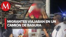 Rescatan a 45 migrantes en Veracruz que eran transportados en un camión con basura