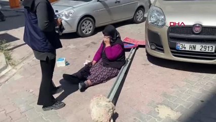 YERE DEVRİLEN İŞARET LEVHASINA TAKILIP DÜŞEN KADIN YARALANDI