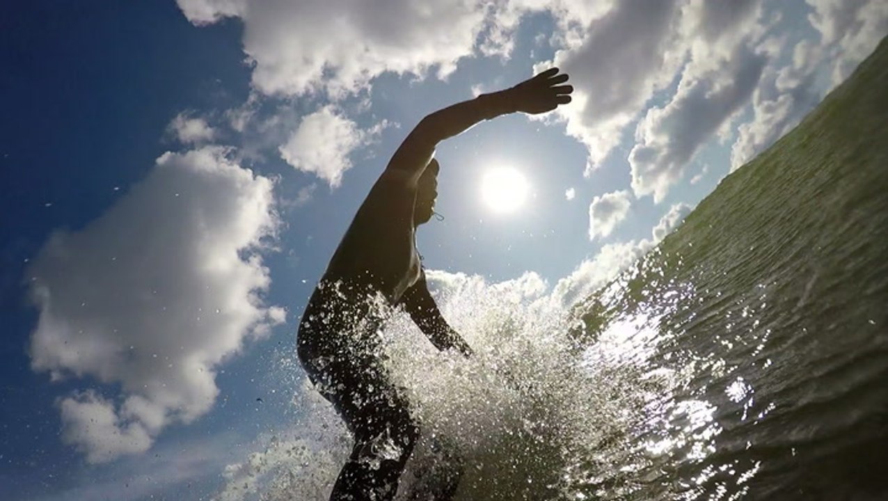 How surf therapy is helping people battle PTSD on the waves of Lake Michigan