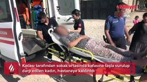 Sokak ortasında vahşet! Karısının kafasına taşla vurdu