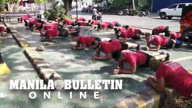 Firefighters of the Davao City Central 911 hold their routine morning exercise