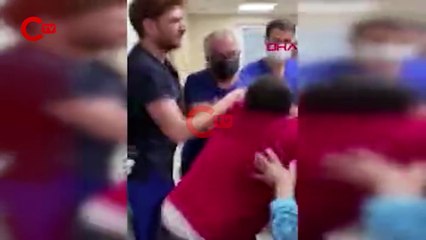 'Maske' uyarısında bulunan doktora 'Çocuğuma bakacaksın' diyerek saldırdı