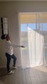 Woman Demonstrates Hack to Put Soothing Curtains in Place of Vertical Blinds