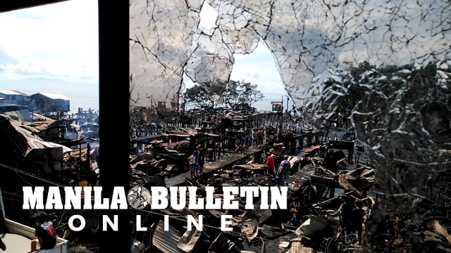 Residents collect scraps and reusable materials from razed houses in Davao City