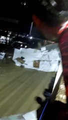 Man and House Get Washed Under Bridge During a Flood