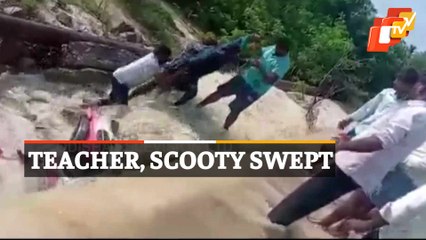 Teacher On Scooter Washed Away In Flood Waters