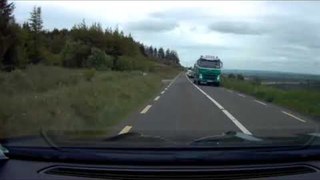 Car Trying to Overtake Truck Crashes Directly With an Oncoming Vehicle