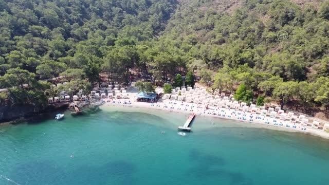 Muğla haberi! Fethiye'de okulun işlettiği plajda mavi bayrak dalgalanıyor