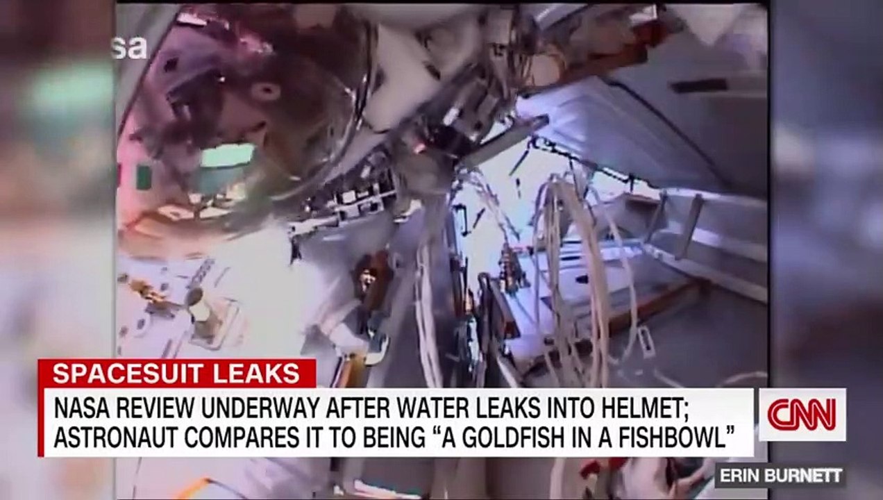 NASA halts spacewalks after water leaked into astronaut's helmet