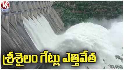 下载视频: Rains Effect _ Flood Water Inflow Continues To Sirsailam Project _ Telangana Rains _ V6 News