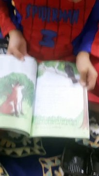 So Amazing | A very Little Kid Reading an Inverted Book | Reading a book upside down is so Difficult