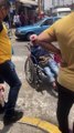 Dog Helps Push Owner in Wheelchair