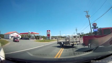 Careless Left Turn Causes Close Call on Busy Road