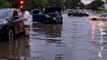 Flash flooding leaves cars stranded in intersection