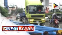 Mga tubong lulan ng trak dumausdos; Daloy ng trapiko sa Ramon Magsaysay blvd., bumagal