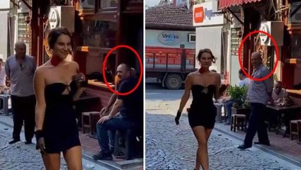 Kahvedeki vatandaşların Beyoğlu'nda yürüyen güzel mankene bakışları dikkat çekti