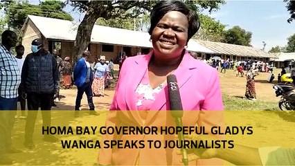 Homa Bay governor hopeful Gladys Wanga speaks to journalists after casting her vote at Alara Korayo primary school in Rangwe