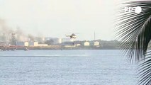 Bombeiros e helicópteros lutam para conter incêndio em Cuba