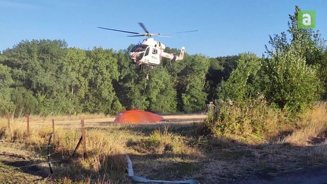 Une piscine: la technique originale des pompiers pour accélérer les largages au dessus de l'incendie du terril