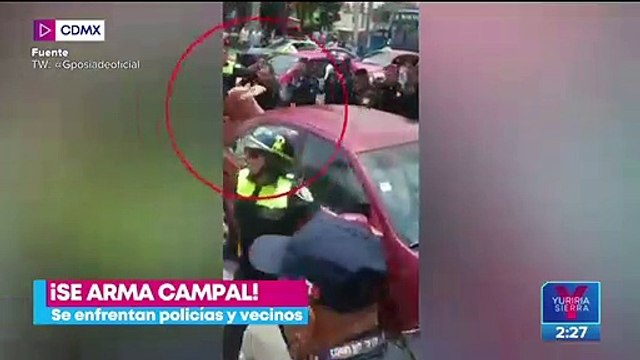 Policías y vecinos se enfrentan en San Juan de Aragón, CDMX