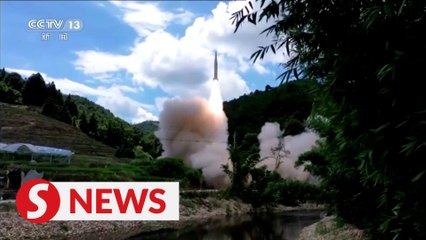 China removes promise not to send troops to Taiwan