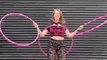 Girl Executes Impressive Juggling Tricks With Hoops