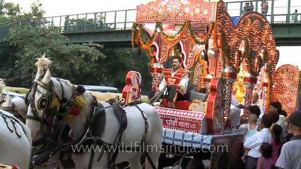 Om Band and horse riders play during Ganesh Chaturthi