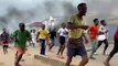 Moment Sierra Leone police appears to fire gun during protests