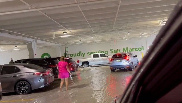 Floodwaters fill a Jacksonville parking garage