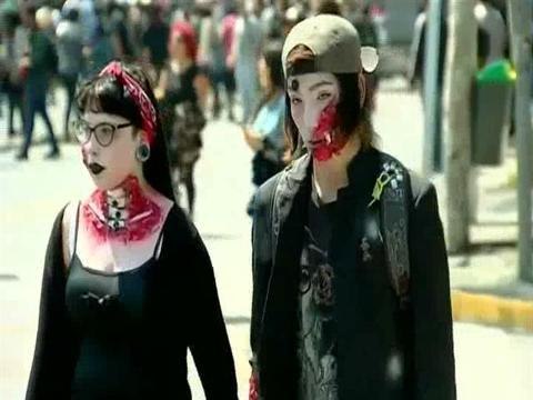 Zombies takeover Chilean capital streets in pre-Halloween festivities