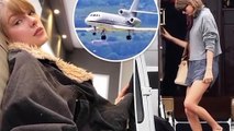 Taylor Swift hide face while getting off private jet