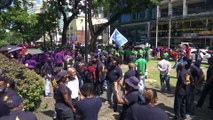 TRADE UNIONS MARCH; HINT TO A WEEK SHUTDOWN