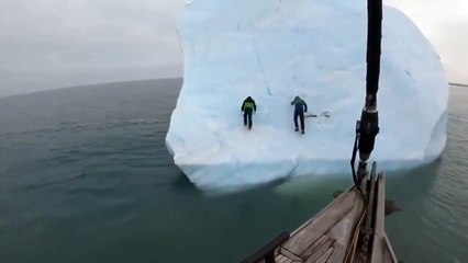 Massive iceberg flips over