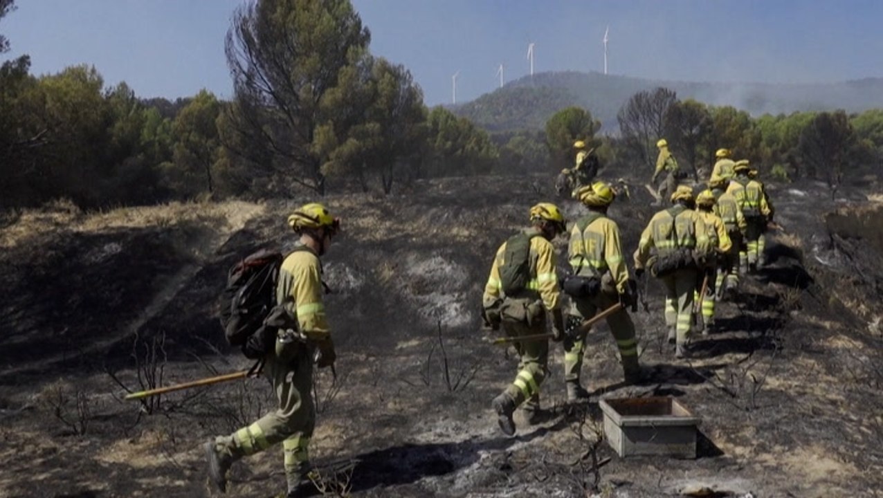 Firefighters work tirelessly to put out flames in Spanish national park