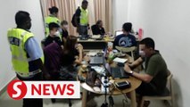 Cops raid scam syndicate's call centre in Jalan Klang Lama condo