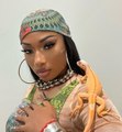 Megan Thee Stallion's Night-Out Look Included a Crop Top and Hot Pants Coordinating Set