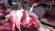 Faster beef cutting by professional butcher in meat Market