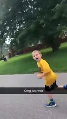 Kid Runs Right Into Parked Car