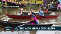 Intip Keseruan Warga Banjarmasin, Meriahkan HUT RI dengan Adu Cepat Makan Kerupuk di Atas Sampan!