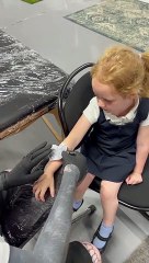 little girl loves her new tattoo