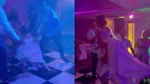 'Bride face plants on dance floor after groom fails to lift her up '