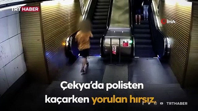Yürüyen merdivene ters binen hırsız polis tarafından yakalandı