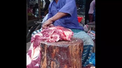 Cow meat cutting skills by expert butcher