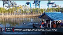 Komunitas Selam Bentangkan Bendera Raksasa di Laut