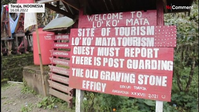 Indonesian villagers clean up dead bodies in an afterlife ritual.