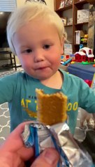 toddler gets super excited over delicious snack